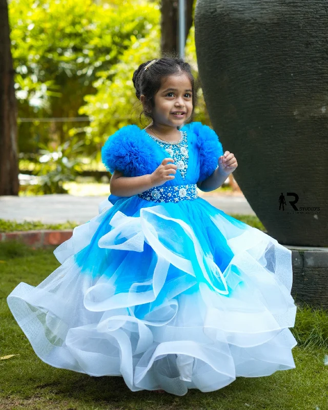 Mid - Week Surprise Pre-Order: Sea blue and white twirled gown with rich white bead work gown